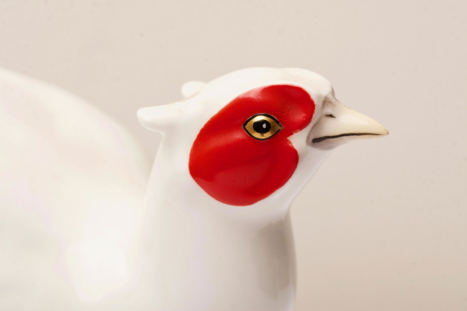 NORITAKE Bone China Bird Figurine: NORITAKE Bone China Bird Figurine by Nippon Toki Kaisha Ltd. (Japan) Overall height : 27cm (approx 11") Bird width: 8.5cm (approx 3.5") Height not including tail : 14cm (approx 5.5") The base dimensio