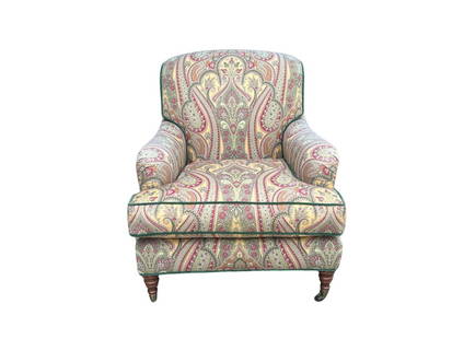 Paisley Upholstered Arm Chair on Casters: 32in w x 35in d x 36in h, Seat height: 19in , Arm height: 23in. PLEASE READ BEFORE PLACING A BID: Pickup for this auction will take place on Friday, June 27th, from 9:00 AM to 12:00 PM at a private re