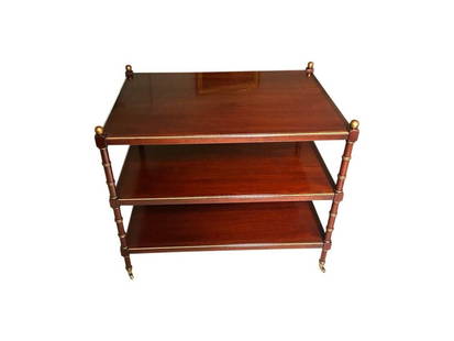 Rectangular 3-Tier Table with Gold Details and Brass Casters: 24 in. w x 33 in. d x 28 in. h. PLEASE READ BEFORE PLACING A BID: Pickup for this auction will take place at a private residence in Rye, NY on Friday, July 25th, from 9:00 AM to 12:00 PM, and Saturday
