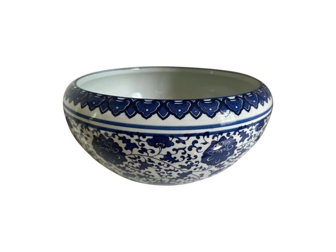 Blue and White Ceramic Bowl: 14 in. diameter x 7 in. h. PLEASE READ BEFORE PLACING A BID: Pickup for this auction will take place at a private residence in Rye, NY on Friday, July 25th, from 9:00 AM to 12:00 PM, and Saturday, Jul