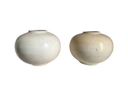 Large Round Cream Ceramic Vases, Pair: 12 in. diameter x 10 in. h. PLEASE READ BEFORE PLACING A BID: Pickup for this auction will take place at a private residence in Rye, NY on Friday, July 25th, from 9:00 AM to 12:00 PM, and Saturday, Ju