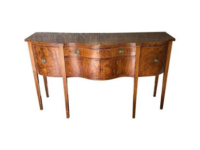 Exceptional Antique Serpentine Sideboard: 70.25 in. w x 37 in. d x 39.75 in. h. Antique condition, piece has cracks throughout consistent with use and age, see photos. PLEASE READ BEFORE PLACING A BID: Pickup for this auction will take place
