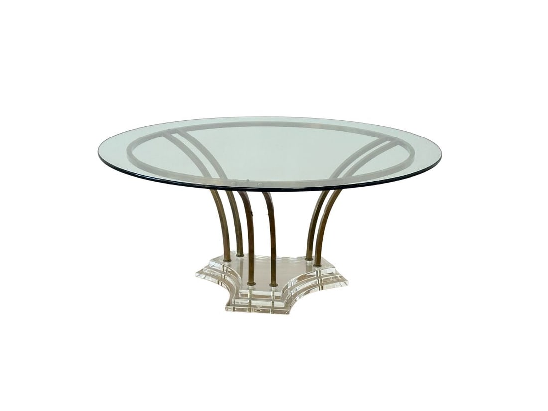 Mid Century Modern Round Glass Top Coffee Table with Brass and Lucite Base: 42 in. diameter x 18.5 in.h. PLEASE READ BEFORE BIDDING: There are two scheduled pickup dates for this auction at our Stamford, CT warehouse: Friday, March 6th from 9:00 AM–12:00 PM and Friday, Marc