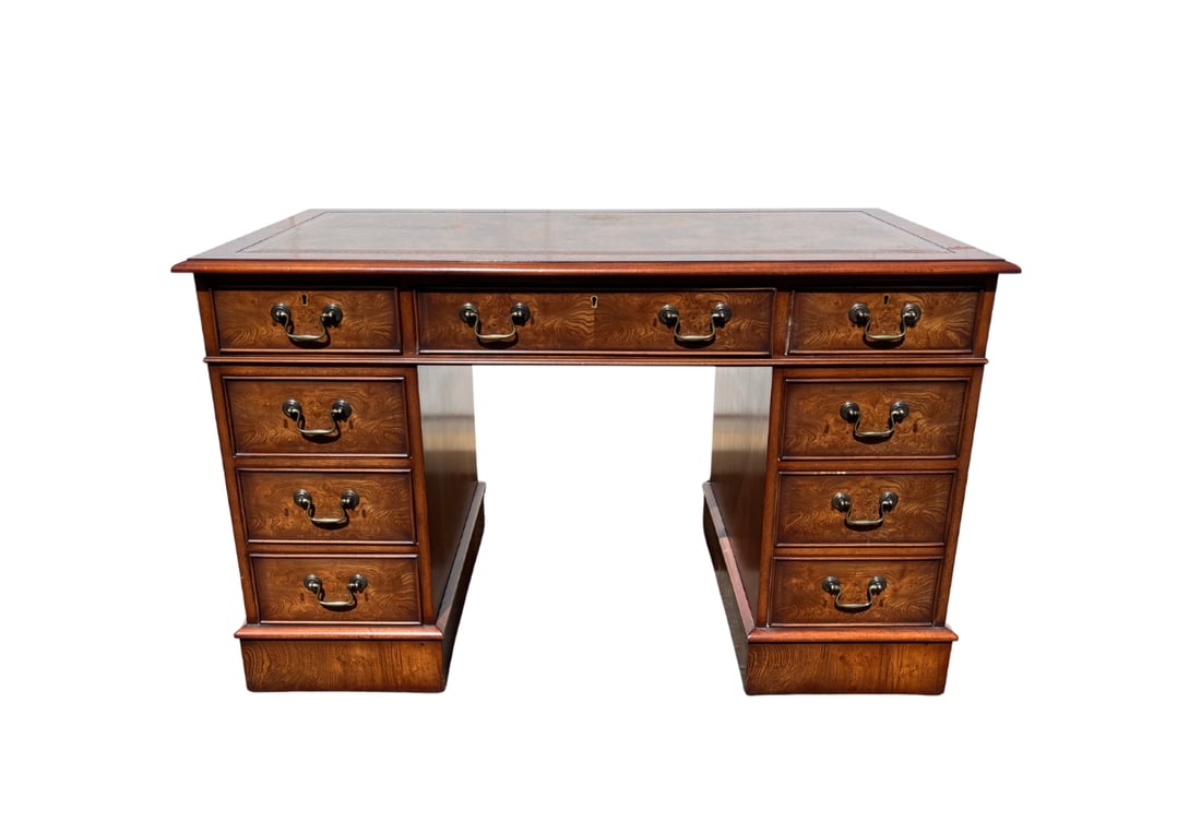 Double Pedestal Burl Mahogany Partners Desk: 48in. w x 24in. d x 30in. h. PLEASE READ BEFORE BIDDING: There is one scheduled pickup date for this auction on Friday, May 15th from 9am- 12pm at a private residence in Rye, NY. The address will be