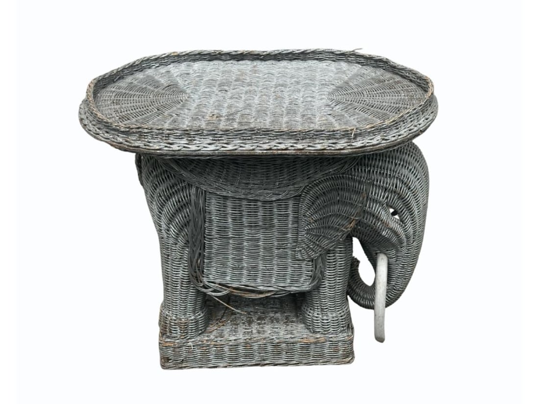 Vintage Wicker Elephant Side Table: 24in. w x 16in. d x 22in. h. PLEASE READ BEFORE BIDDING: There is only one scheduled pickup date for this auction on Friday, June 5th from 9am- 12pm at a private residence in Rye, NY. The address
