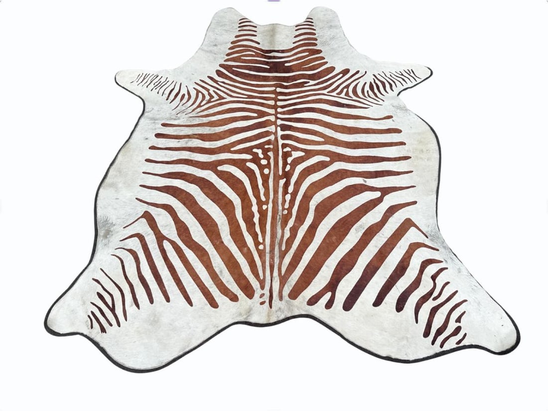 Zebra Stenciled Hide Rug: 72in. w x 86in. l. PLEASE READ BEFORE BIDDING: There is only one scheduled pickup date for this auction on Friday, June 5th from 9am- 12pm at a private residence in Rye, NY. The address will be