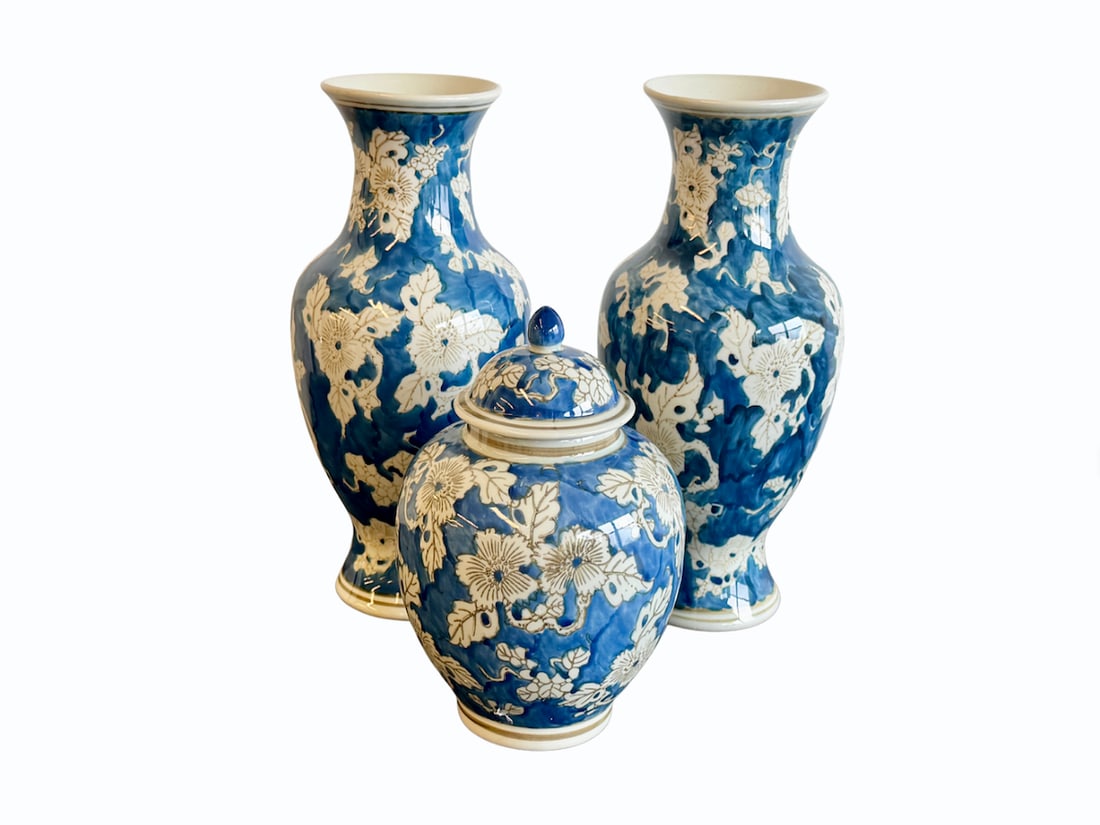 Blue and White Urn Collection, Set of 3: 2 Vases: 6in. diameter x 14in. h, 1 Urn: 7in. diameter x 10in. h. PLEASE READ BEFORE BIDDING: There is only one scheduled pickup date for this auction on Friday, June 5th from 9am- 12pm at a private r