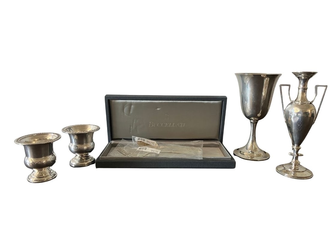 Sterling Silver Collection: Chalice, 3.5 in diameter x 6.625 in h. Small votive, 2.5 in diameter x 2.75 in h.
