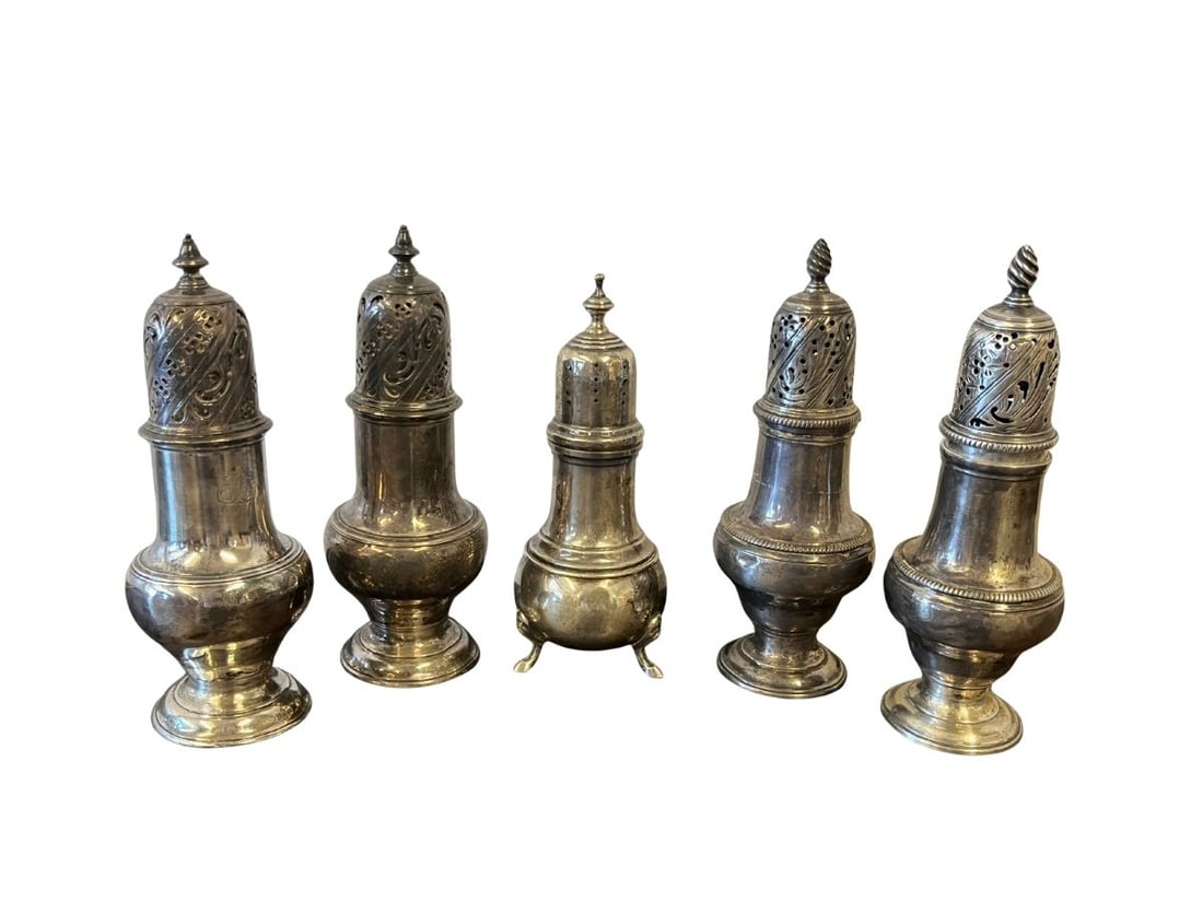 Collection of Five Sterling Silver Salt and Pepper Shakers: Tallest, 2 in diameter x 5.5 in high. 2 in diameter x 5.25 in h.