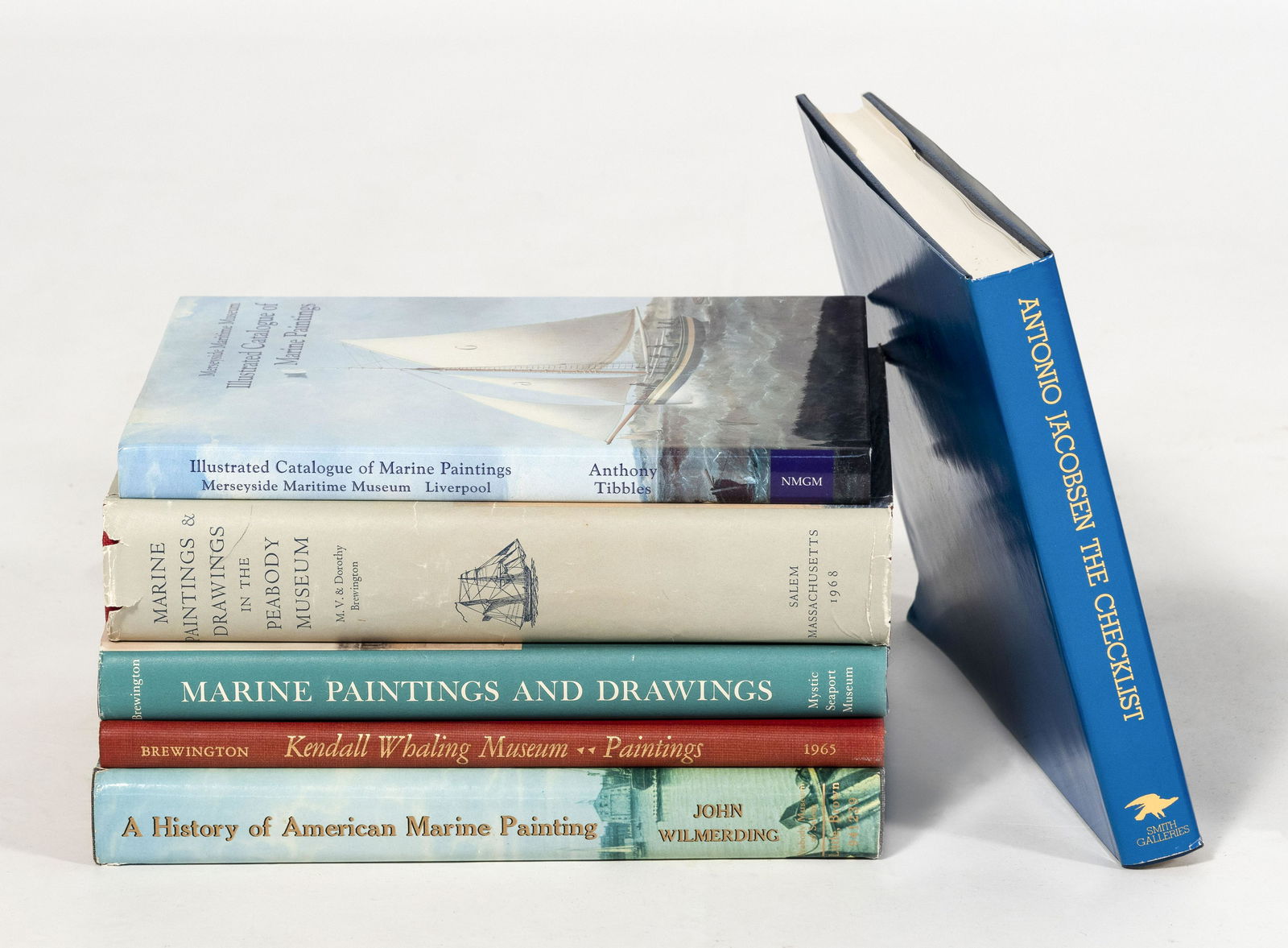 SIX BOOKS ON MARINE ART Sizes, bindings and conditions: SIX BOOKS ON MARINE ART Sizes, bindings and conditions vary. Includes Antonio Jacobsen: The Checklist, Marine Paintings & Drawings in the Peabody Museum, A History of American Marine Painting, and vol