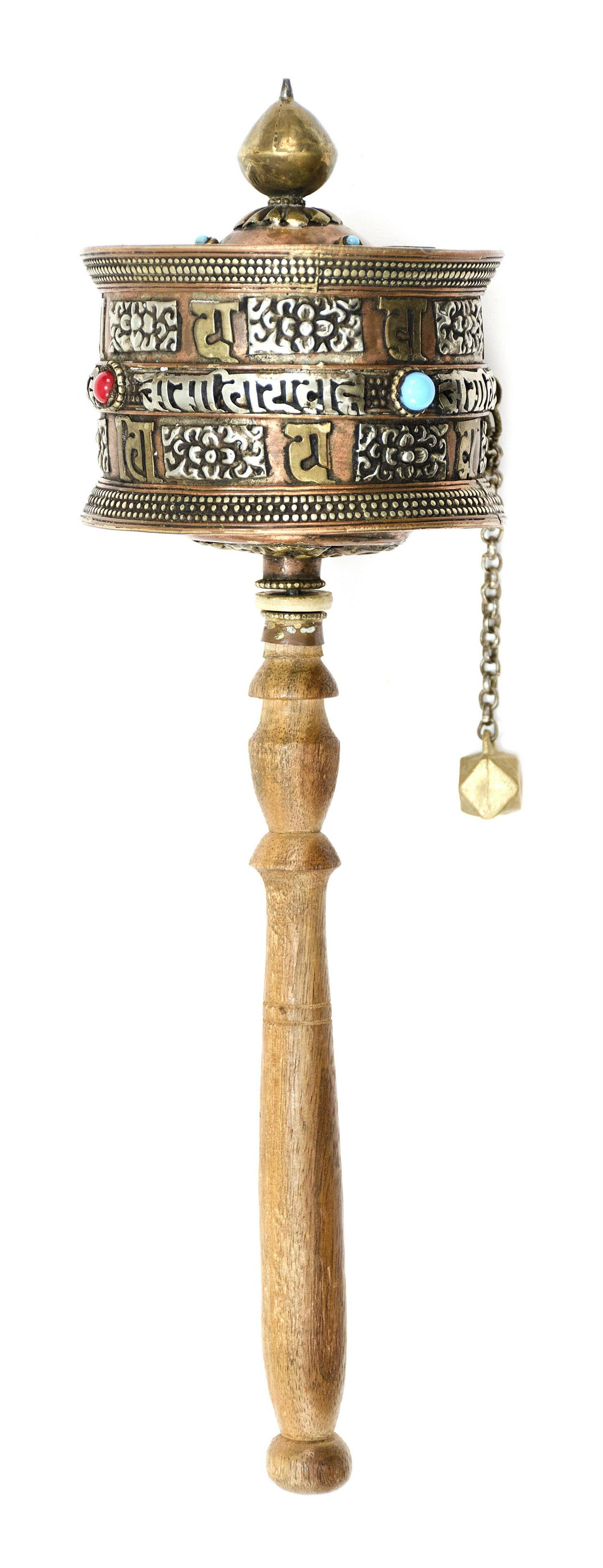 TIBETAN COPPER AND BRASS PRAYER WHEEL In drum form,: TIBETAN COPPER AND BRASS PRAYER WHEEL Late 20th Century In drum form, with decoration of calligraphy and flowers. Turned wooden handle. Length 12.5".