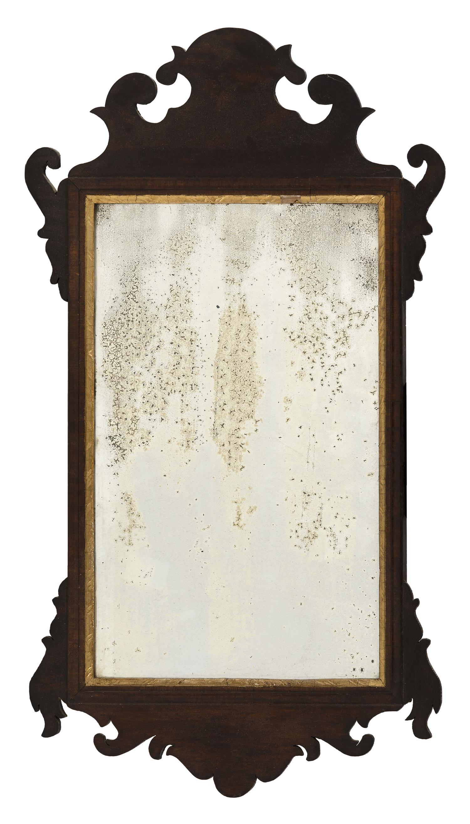 CHIPPENDALE-STYLE MIRROR Mahogany frame with gilt: CHIPPENDALE-STYLE MIRROR Late 19th Century Mahogany frame with gilt liner. Height 27.5". Width 15".