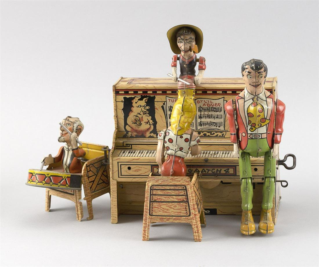 LI'L ABNER "DOG PATCH 4" PIANO BAND LITHOGRAPHED: LI'L ABNER "DOG PATCH 4" PIANO BAND LITHOGRAPHED WIND-UP TOY America, Copyright 1945 Made by the Unique Art Manufacturing Co., Inc. Appears to be in working order. Height 5.5". Total length 9". Total 