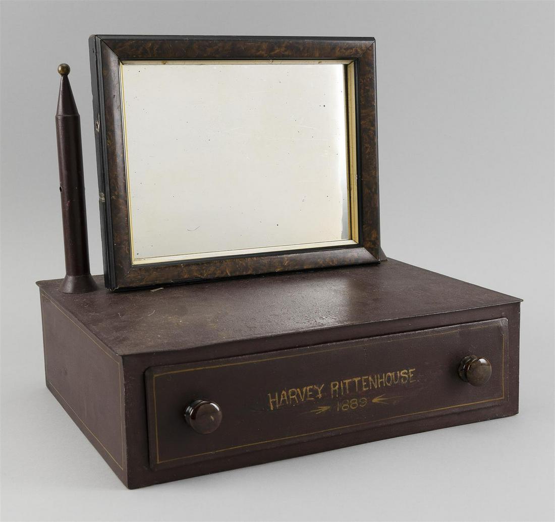TIN SHAVING STAND Painted red with yellow "Harvey: TIN SHAVING STAND Late 19th Century Painted red with yellow "Harvey Rittenhouse 1889" and highlights. One drawer. Non-matching mirror. Height 12". Width 14". Depth 10".