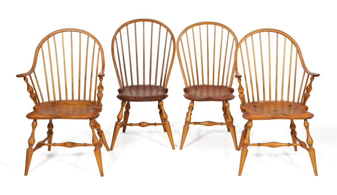FOUR CONTEMPORARY WINDSOR BOWBACK CHAIRS Two armchairs: FOUR CONTEMPORARY WINDSOR BOWBACK CHAIRS Two armchairs and two side chairs. In maple. Back heights 38.5". Seat heights 17.5".
