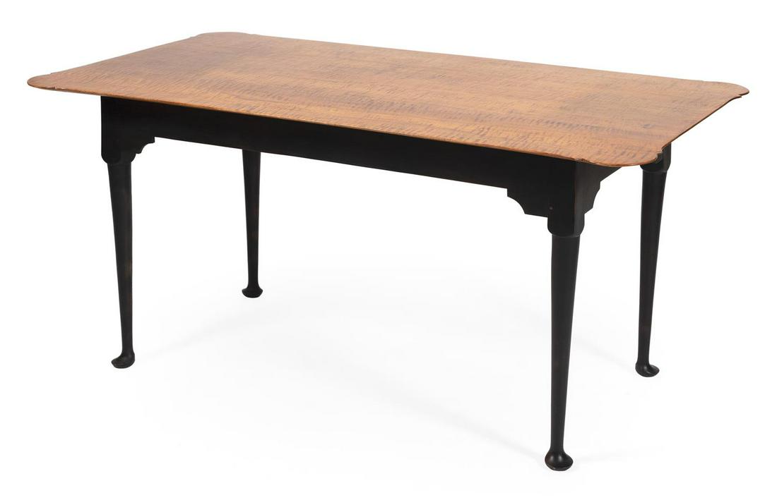 HARVEST TABLE In tiger maple and maple. Top with: HARVEST TABLE Contemporary In tiger maple and maple. Top with porringer corners. Tapered legs end in pad feet. Height 30". Length 60". Width 34".