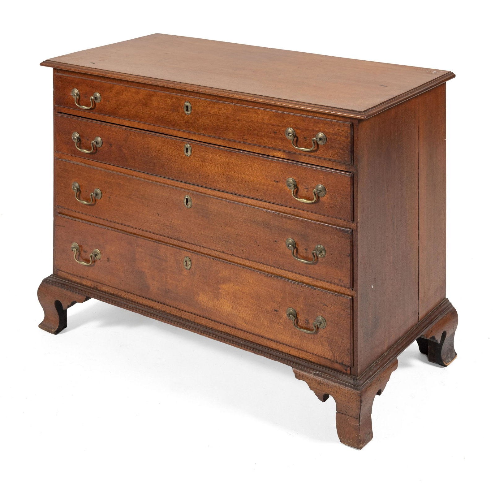 CHIPPENDALE FOUR-DRAWER BUREAU In mahogany. Four: CHIPPENDALE FOUR-DRAWER BUREAU Circa 1780 In mahogany. Four graduated full-width drawers with brass bail pulls. Ogee bracket feet. Height 32". Width 43". Depth 21.5".