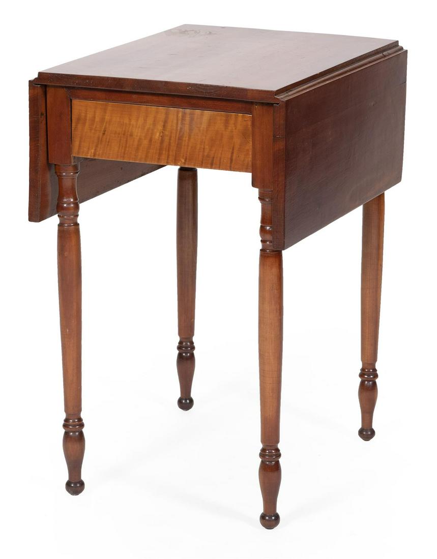 SHERATON ONE-DRAWER DROP-LEAF STAND In cherry and curly: SHERATON ONE-DRAWER DROP-LEAF STAND Early 19th Century In cherry and curly maple. Simple turned legs. Height 29". Width 17.5" plus two 9.5" drop leaves. Depth 21.5".