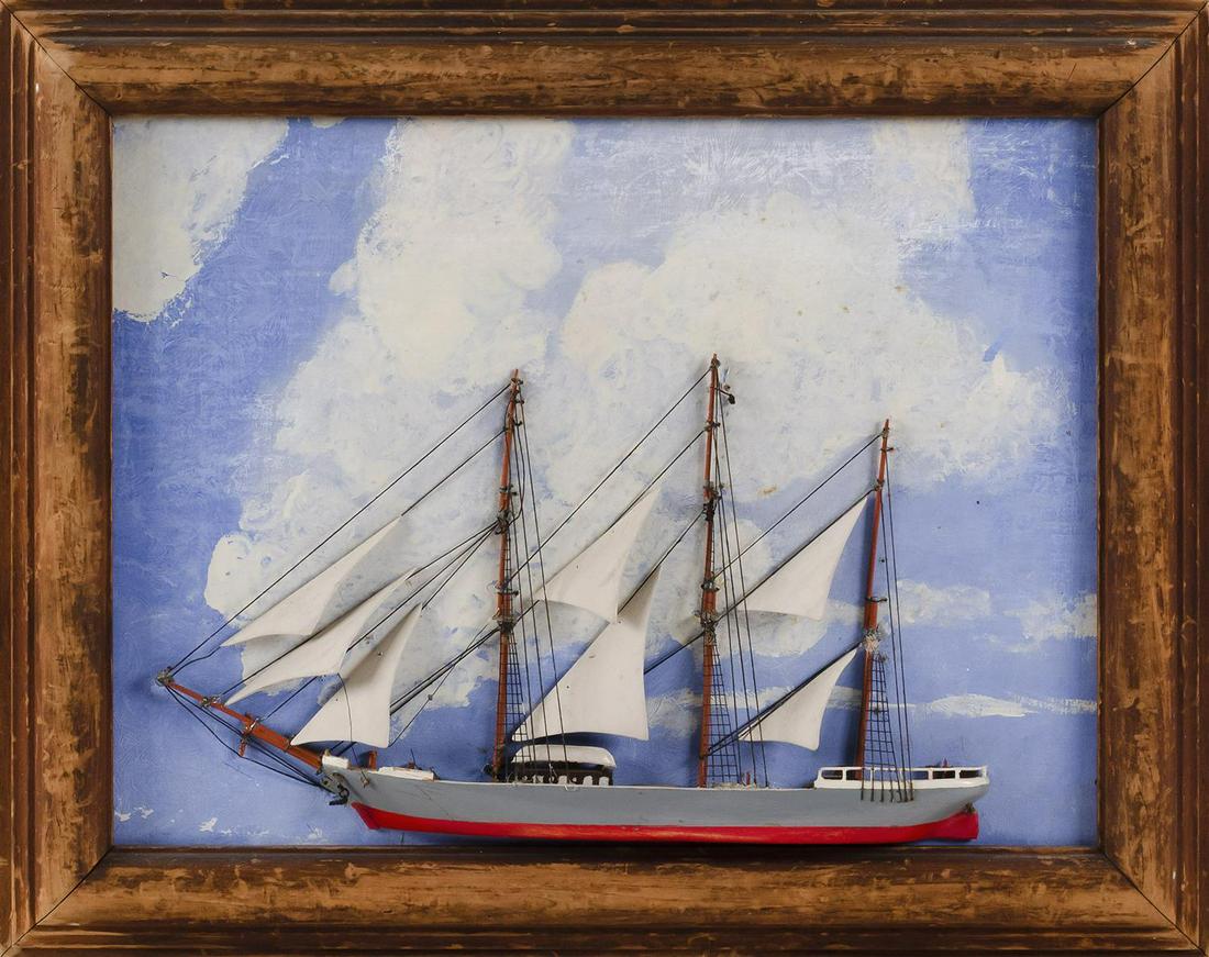 SHADOW BOX MODEL OF A THREE-MASTED SHIP Together with a: SHADOW BOX MODEL OF A THREE-MASTED SHIP 20th Century Together with a charcoal drawing by Frederick Jillson titled "Retired by the Sea". 7" x 5" sight. Framed 11.25" x 9.25". Shadow box model's ship wi