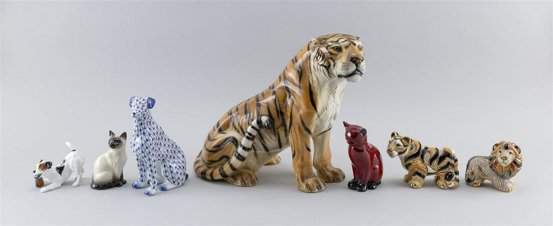 SEVEN EUROPEAN PORCELAIN CAT AND DOG FIGURINES First: SEVEN EUROPEAN PORCELAIN CAT AND DOG FIGURINES First Half of the 20th Century Includes Beswick, Herend, de Rosa and Royal Doulton Flambé, and a tiger marked "Italian". Heights from 3" to 12".