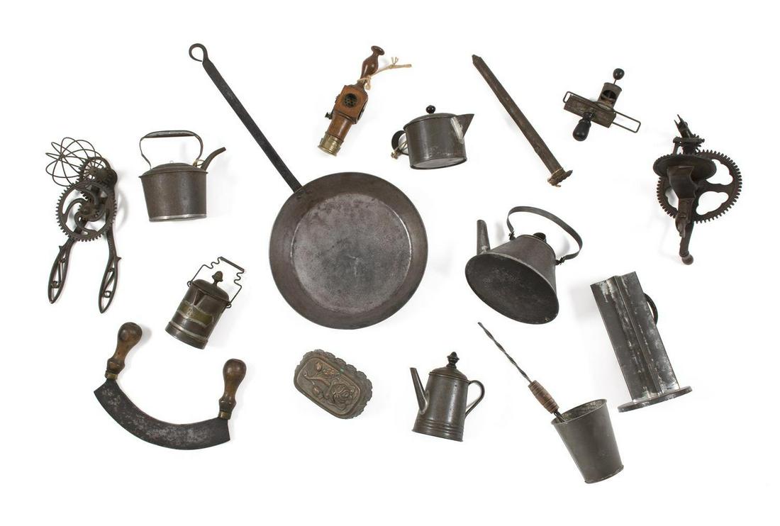 FIFTEEN ASSORTED PIECES OF TIN KITCHENWARE Mostly: FIFTEEN ASSORTED PIECES OF TIN KITCHENWARE Mostly 19th/Early 20th Century Includes a frying pan, assorted mixers, teapots, molds, graters, etc. Heights from 5" to 8".
