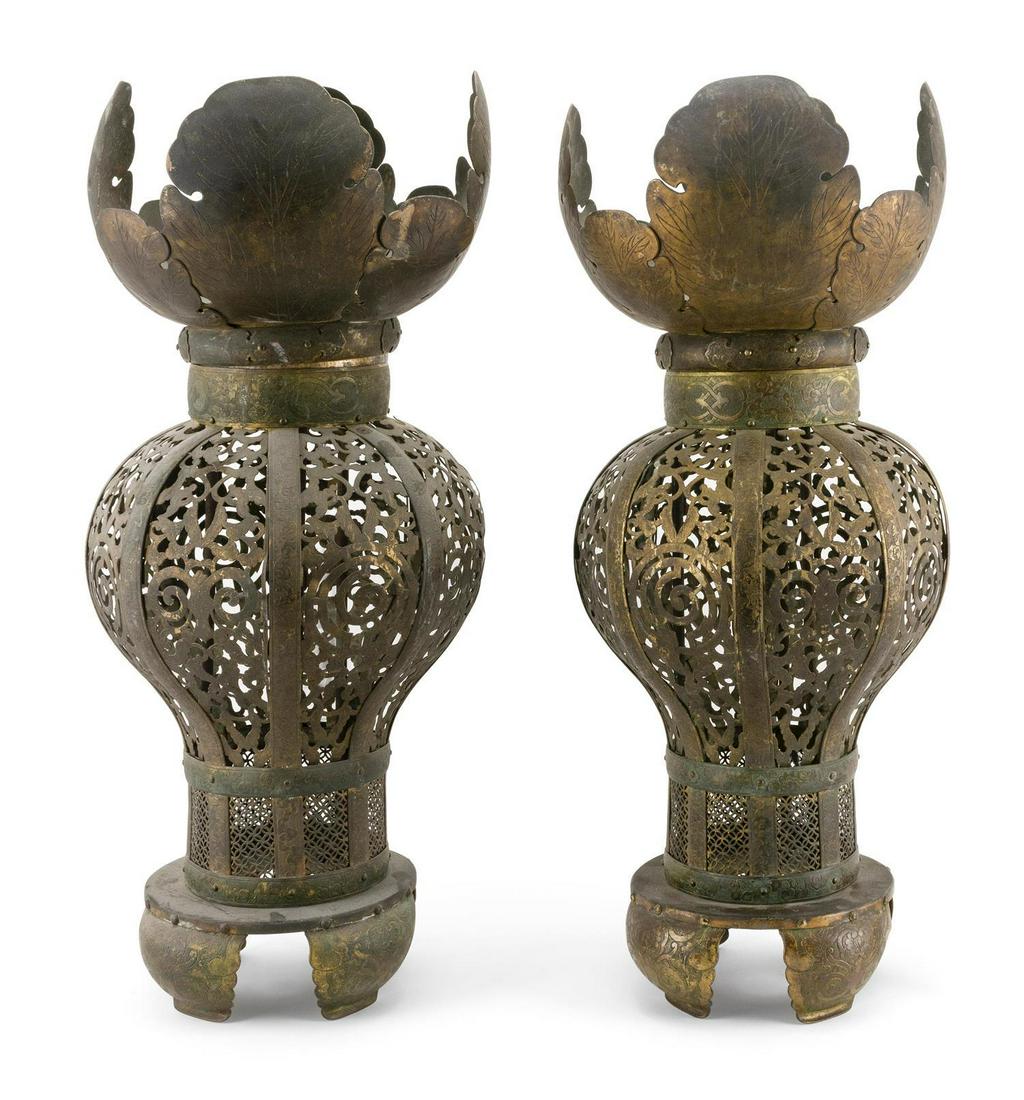 PAIR OF JAPANESE BRASS HANGING LANTERNS Edo Period In: PAIR OF JAPANESE BRASS HANGING LANTERNS Edo Period In baluster form, with four-lobed mon crest. Traces of gilding. Heights 29".