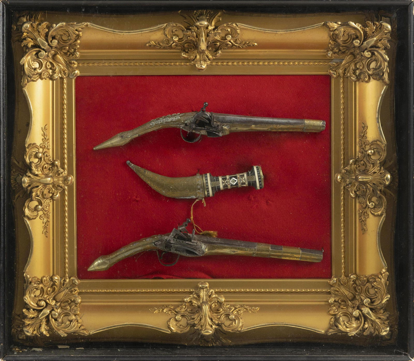 TWO MIDDLE EASTERN PISTOLS AND A KNIFE WITHIN A SHADOW (1 of 2)