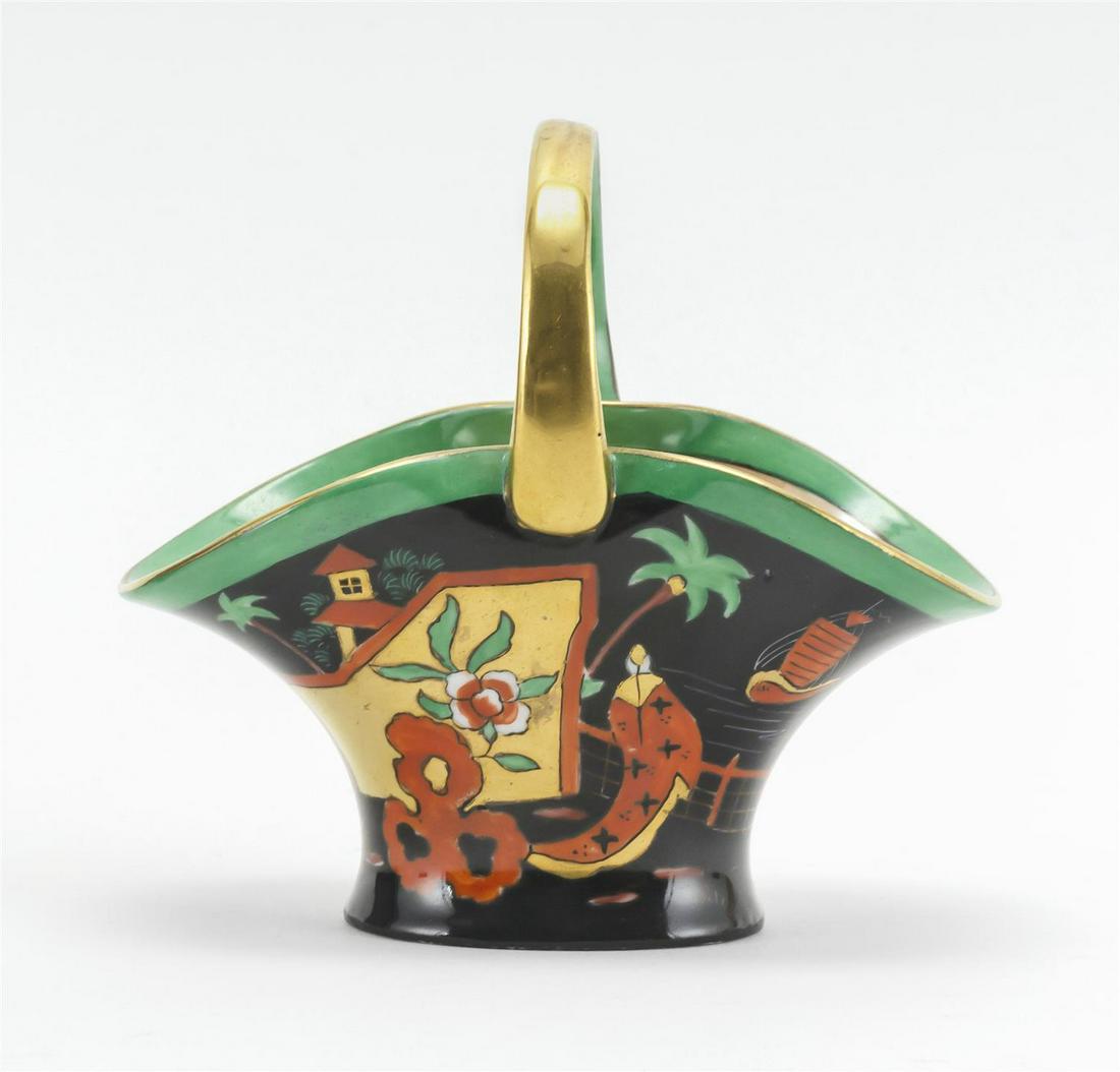 NORITAKE PORCELAIN BASKET With chinoiserie decoration.: NORITAKE PORCELAIN BASKET With chinoiserie decoration. Noritake mark on base. Height 4.4".
