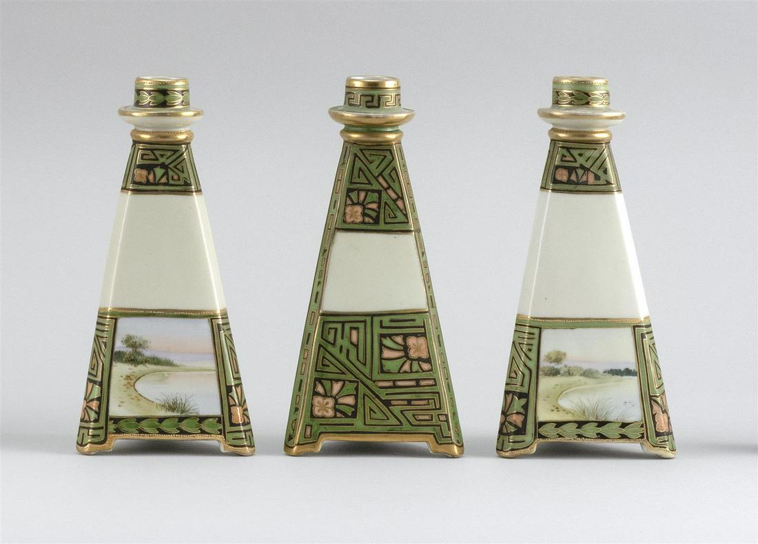 THREE NIPPON PORCELAIN CANDLESTICKS Triangular, with a (1 of 3)