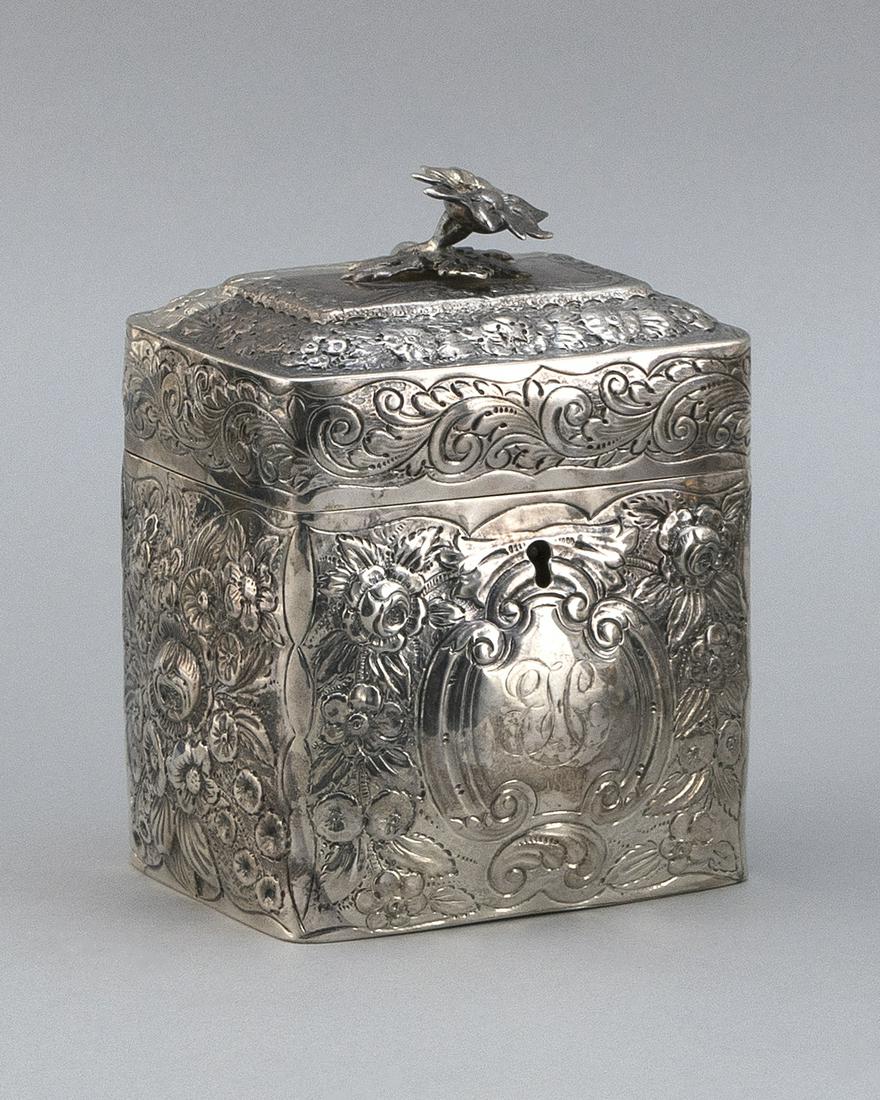 GEORGE III STERLING SILVER TEA CADDY London, 1799: GEORGE III STERLING SILVER TEA CADDY London, 1799 Peter & Ann Bateman, maker. Floriform finial. Repoussé floral design. Height 5.5".Base measures 4 1/8” x 3 1/8”. Approx. 15.8 troy oz.