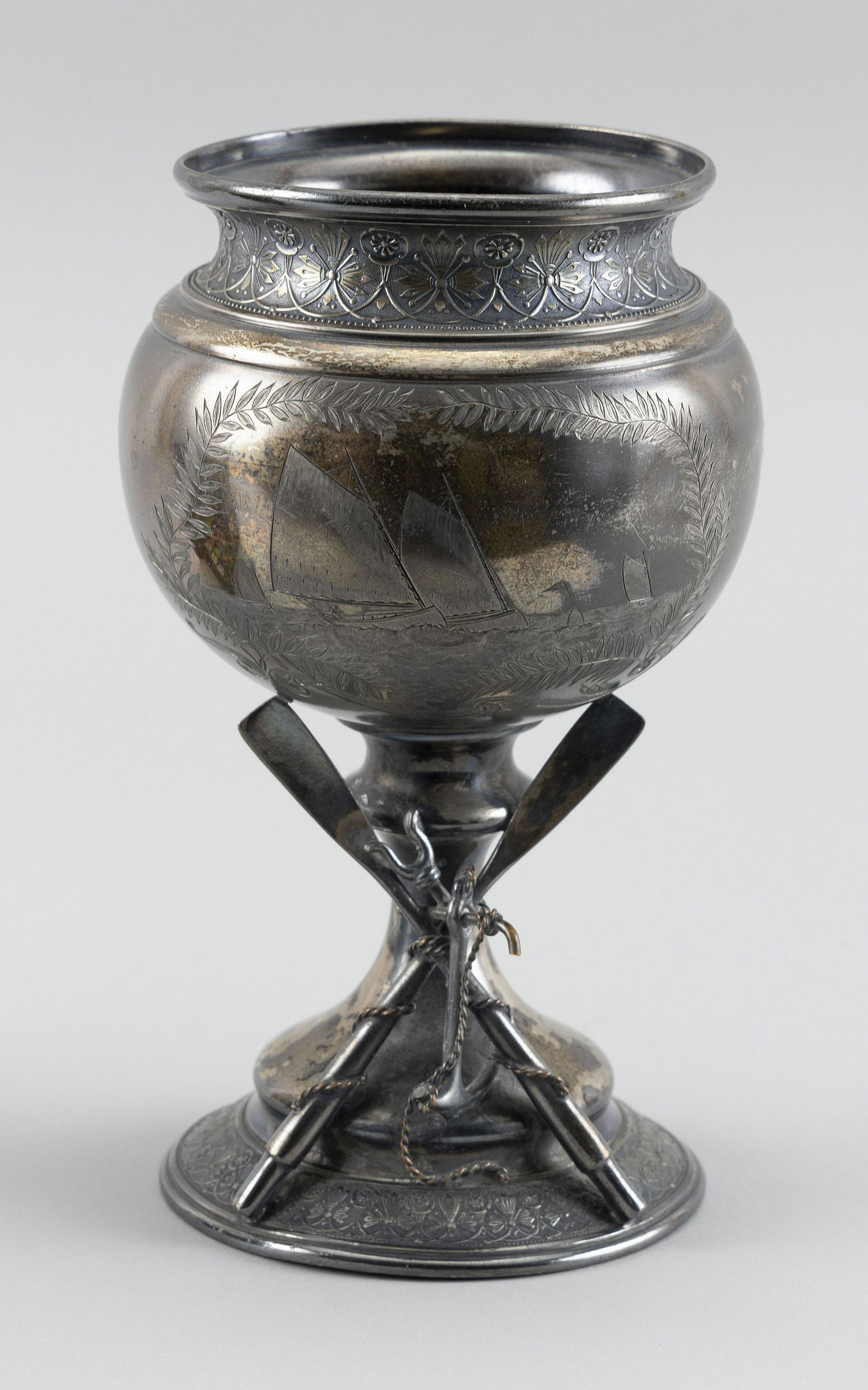 PAIRPOINT SILVER PLATED YACHT CLUB TROPHY: PAIRPOINT SILVER PLATED YACHT CLUB TROPHYFrom the Burgess Yacht Club. Dated 1896. Etched with a sailboat, oar and anchor design. Height 7.25".