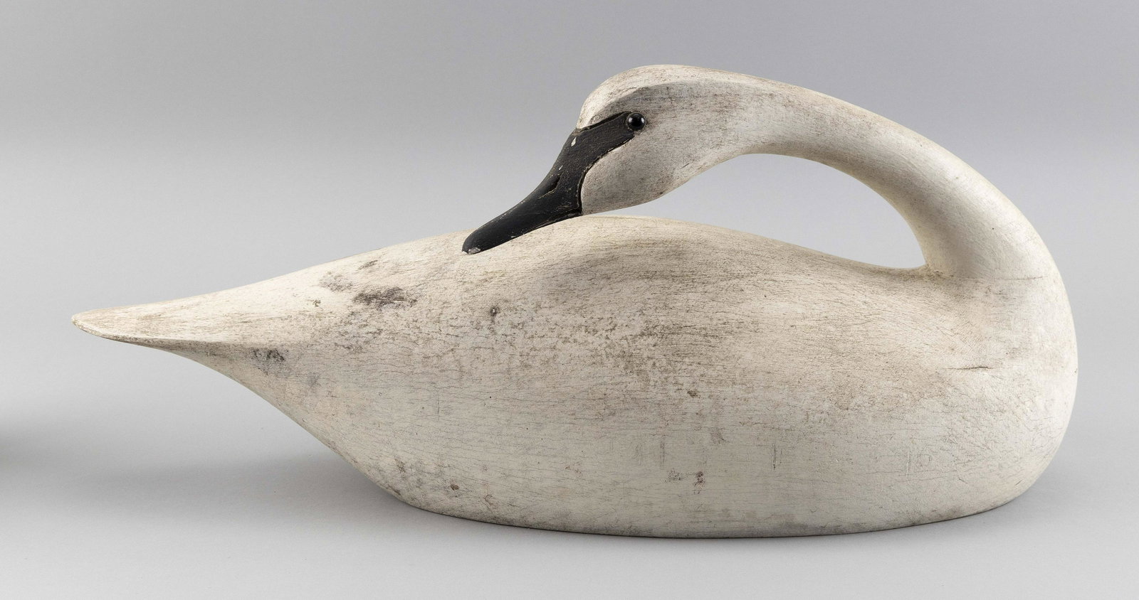 BYRON BRUFFEE CARVING OF A SWAN Middleboro,: BYRON BRUFFEE CARVING OF A SWAN Middleboro, Massachusetts, 20th Century In preening position. Length 21".