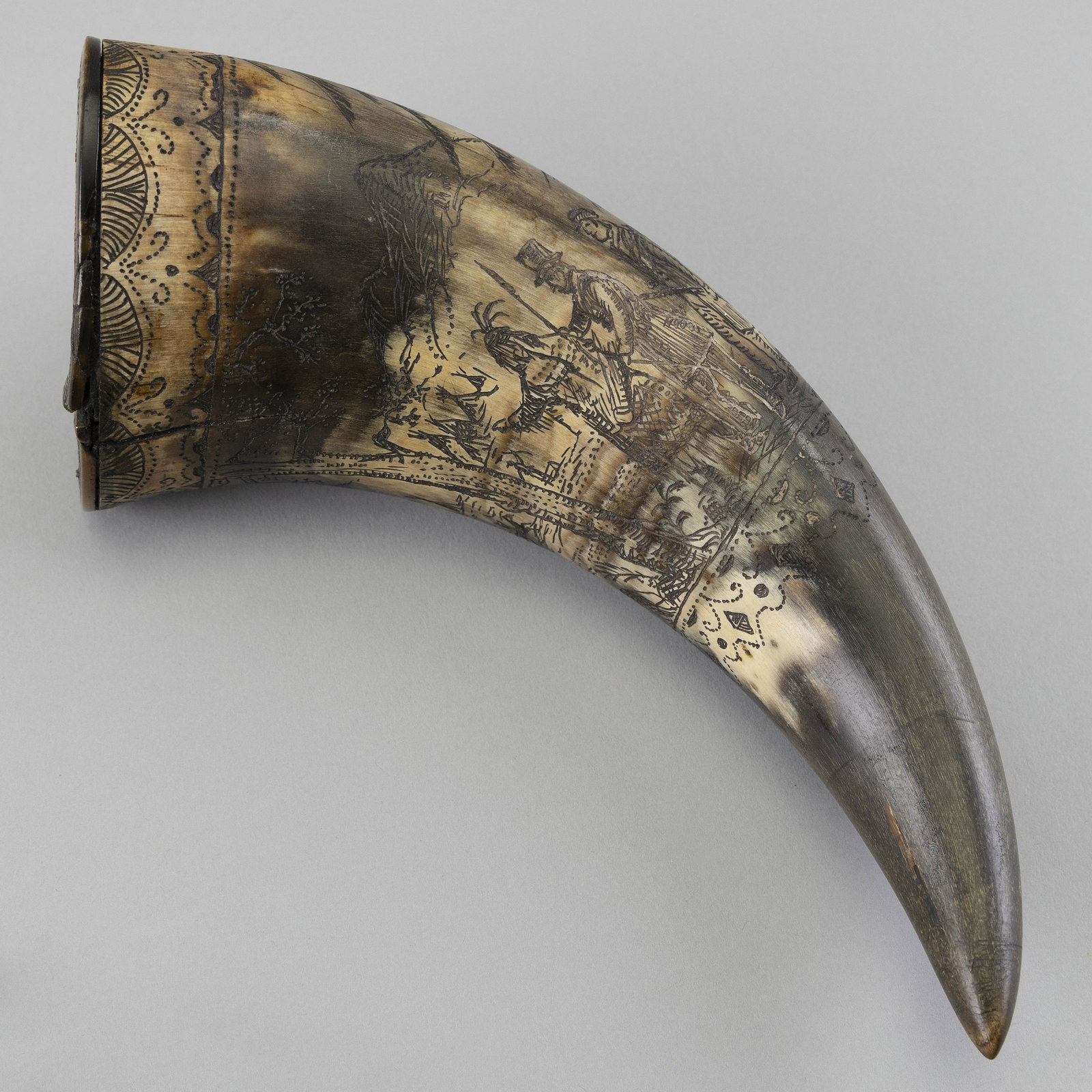 ENGRAVED STEER HORN SNUFF BOX Length 7".: ENGRAVED STEER HORN SNUFF BOX 19th Century box with 20th Century engraving titled "A Gentleman's Agreement", depicting a scene of American Natives and a frontiersman. Length 7".