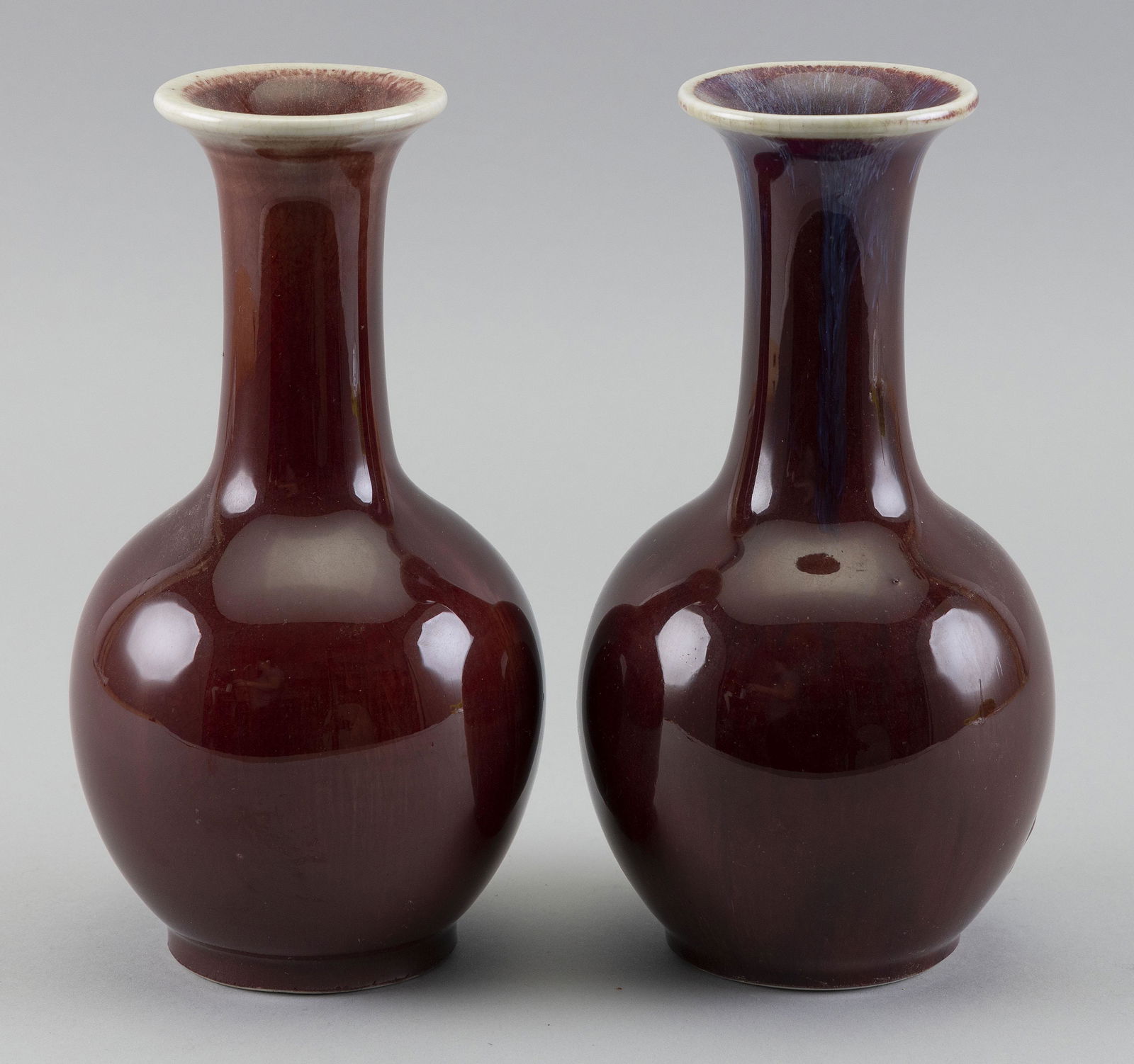 PAIR OF CHINESE SANG DE BOEUF PORCELAIN BOTTLE VASES (1 of 2)