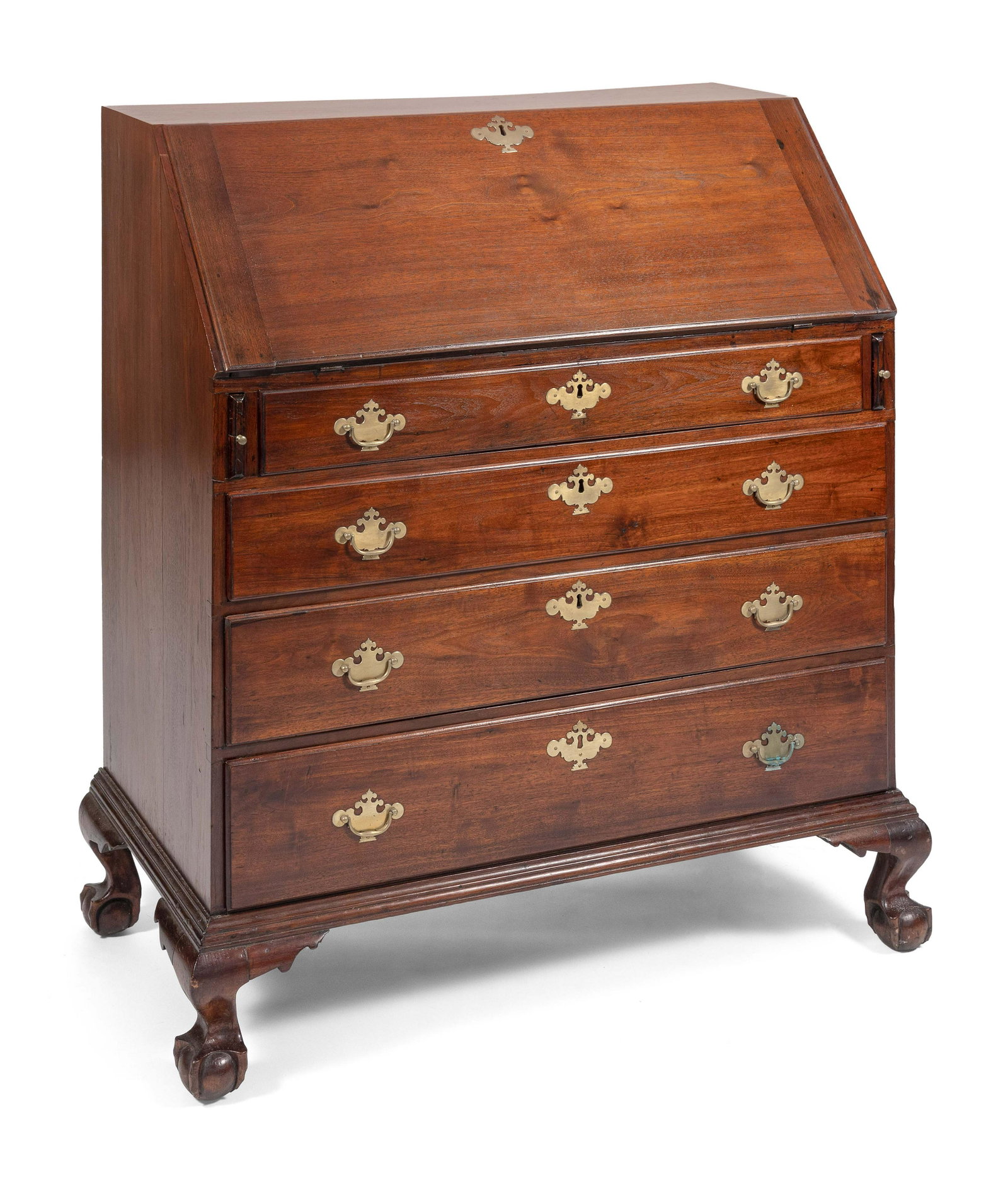 CHIPPENDALE SLANT-LID DESK Boston, Circa 1780 Height: CHIPPENDALE SLANT-LID DESK Boston, Circa 1780 In walnut. Block and shell-carved interior fitted with pigeonholes, drawers and a central compartment. Case with four graduated full-width drawers with mo