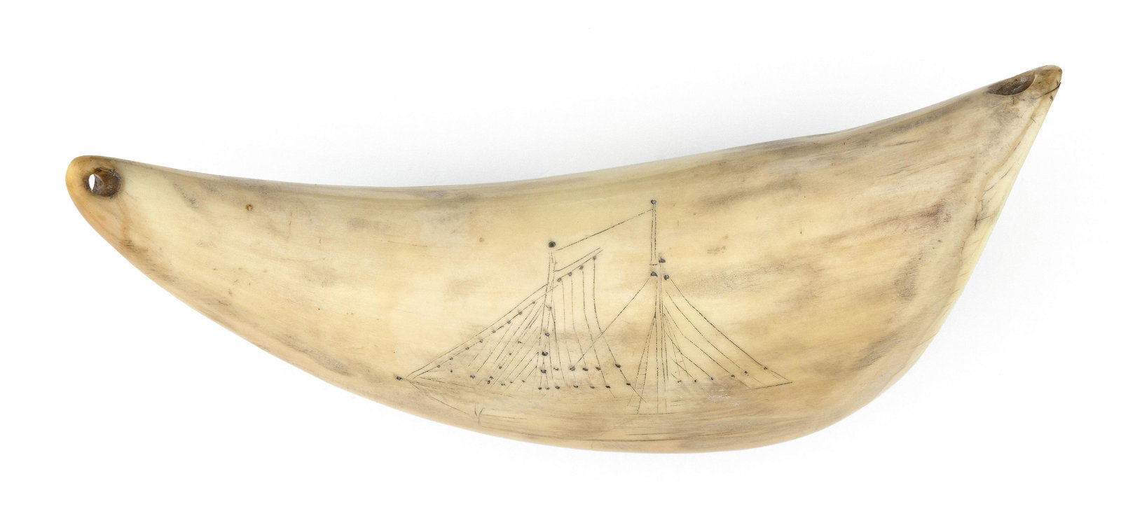 SCRIMSHAW WHALE: TABUA SCRIMSHAW WHALE'S TOOTH DEPICTING A SCHOONER Mid-19th Century Several points on the sails and the tips of the bowsprit and masts are deeply stippled. Tooth pierced at tip and base for possible u
