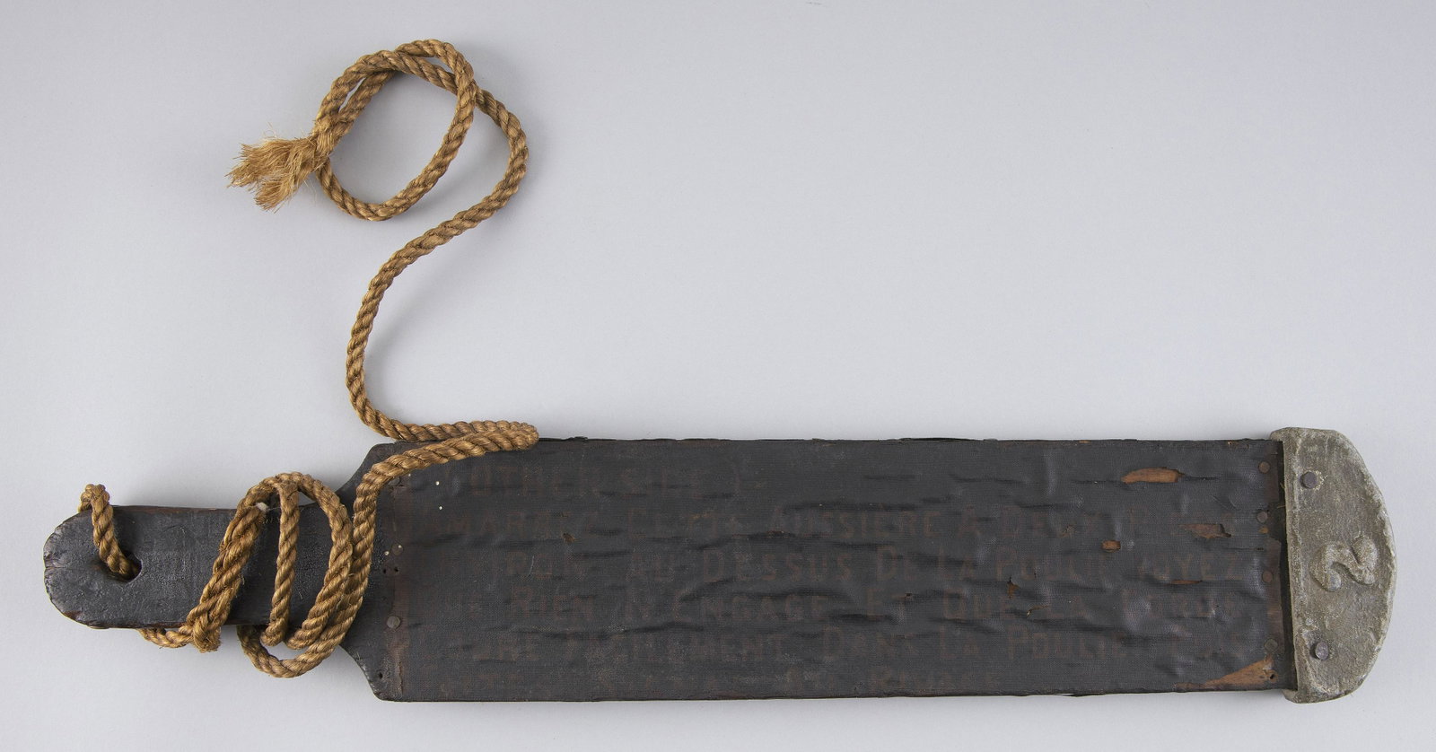 RARE CANVAS-COVERED WOODEN TALLY BOARD Late 19th/Early: RARE CANVAS-COVERED WOODEN TALLY BOARD Late 19th/Early 20th Century Canvas with painted instructions in English and French. Length 21”. Width 4.25”.