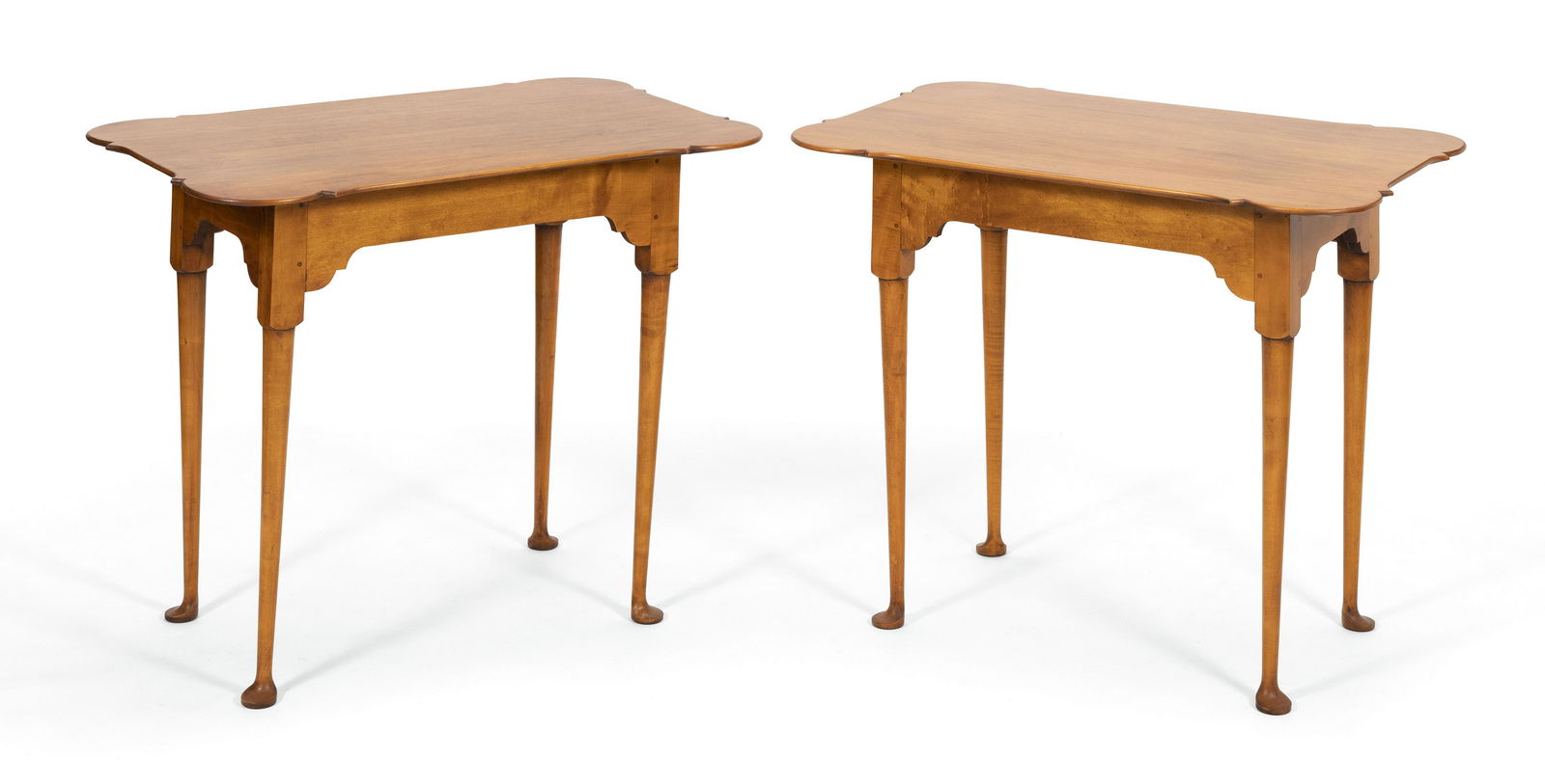 PAIR OF ELDRED WHEELER QUEEN ANNE-STYLE TEA TABLES: PAIR OF ELDRED WHEELER QUEEN ANNE-STYLE TEA TABLESMassachusetts, 20th CenturyIn maple and tiger maple. Tops with cut porringer corners. Tapered legs end in pad feet. Original Eldred Wheeler paper labe