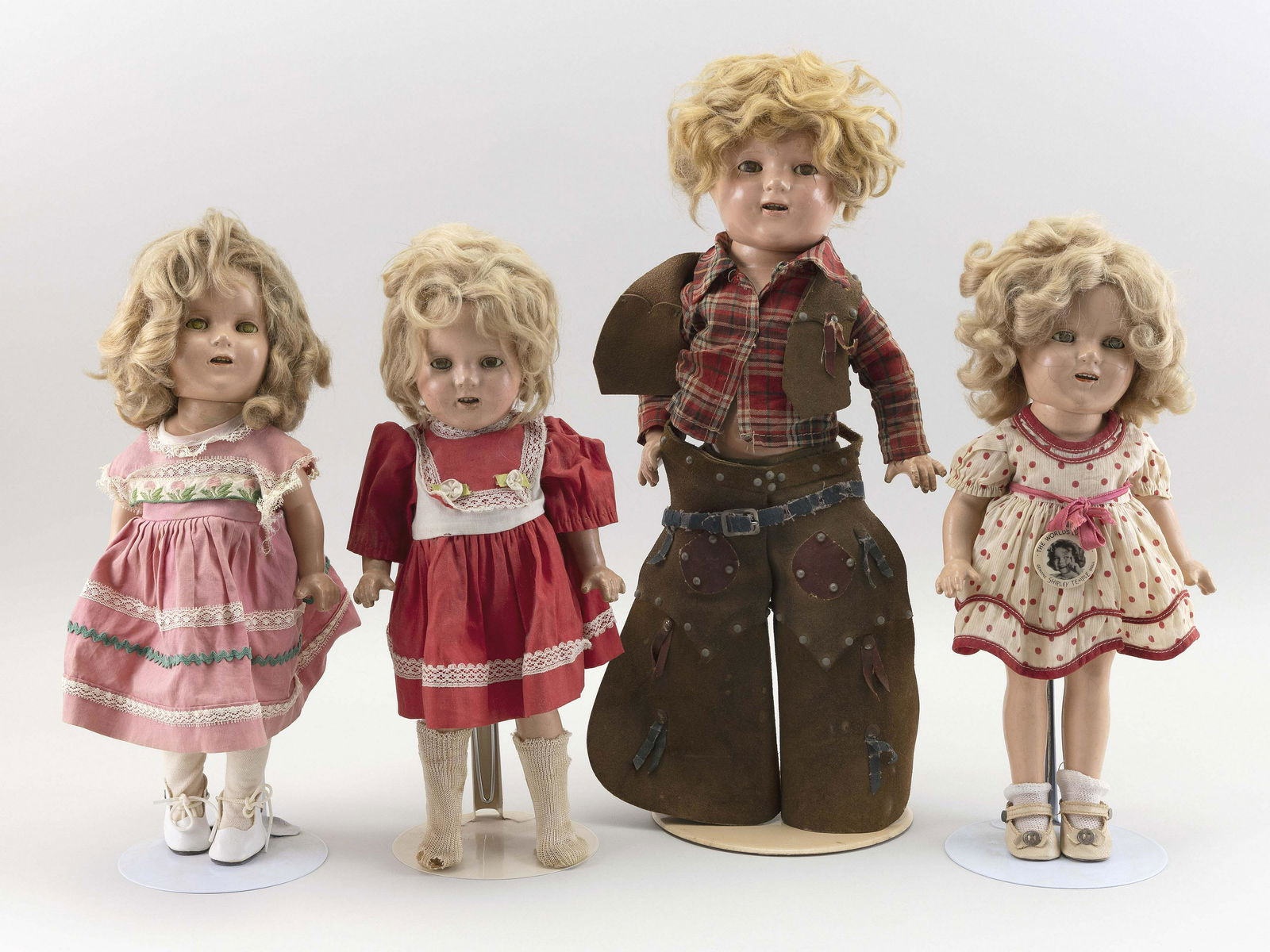 FOUR COMPOSITION SHIRLEY TEMPLE DOLLS (1 of 3)