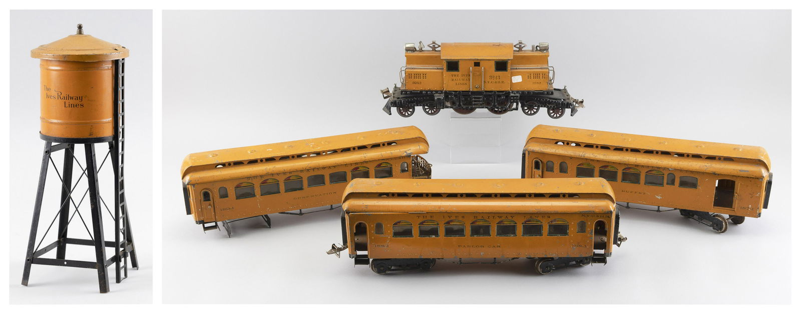 SET OF FOUR IVES TRAINS AND A TRACK TOWER (1 of 4)