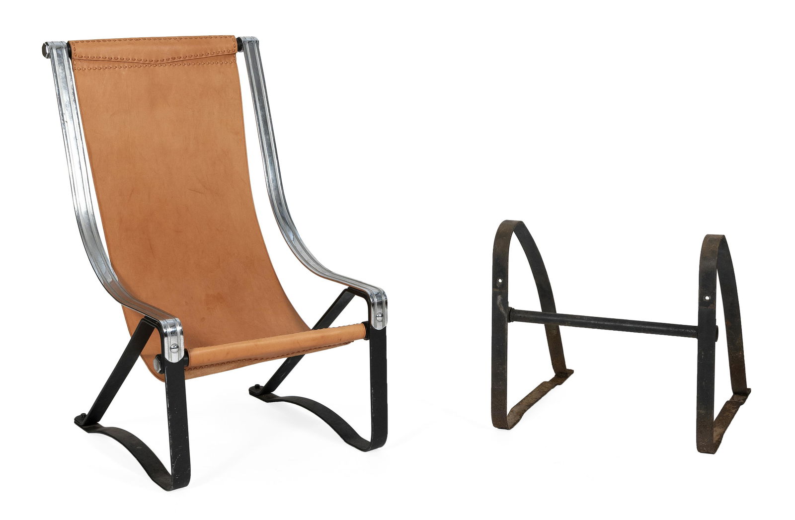 SALVATORE BEVELACQUA FOR MCKAY CRAFT FURNITURE LEATHER,: SALVATORE BEVELACQUA FOR MCKAY CRAFT FURNITURE LEATHER, STEEL AND CHROME SLING CHAIR Pittsburgh, Pennsylvania Together with the chrome and steel frame for a second chair. Height 40.5".