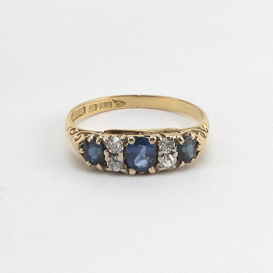 ENGLISH 18KT GOLD, SAPPHIRE AND DIAMOND RING Set with (1 of 1)