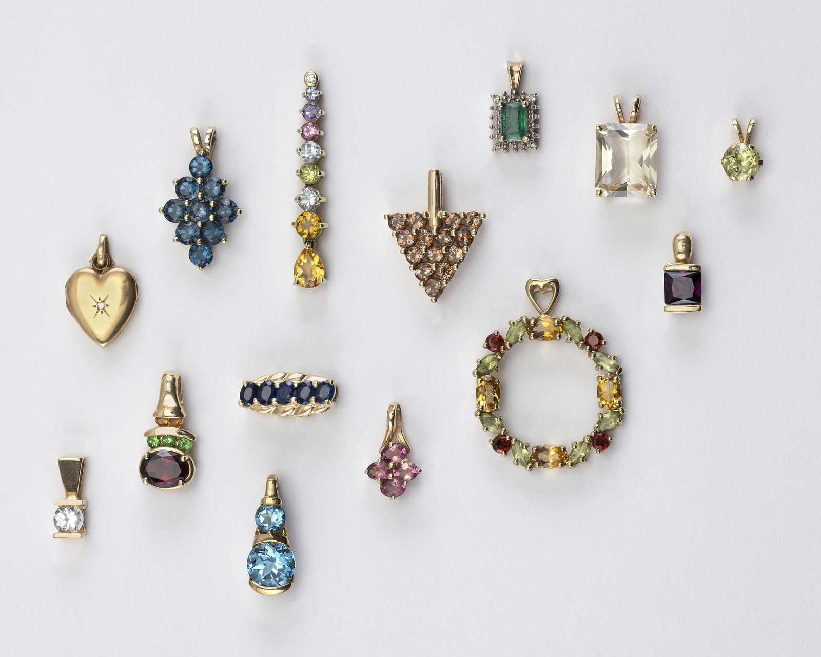 FOURTEEN GOLD AND GEM-SET PENDANTS 1) Unmarked gold, (1 of 1)
