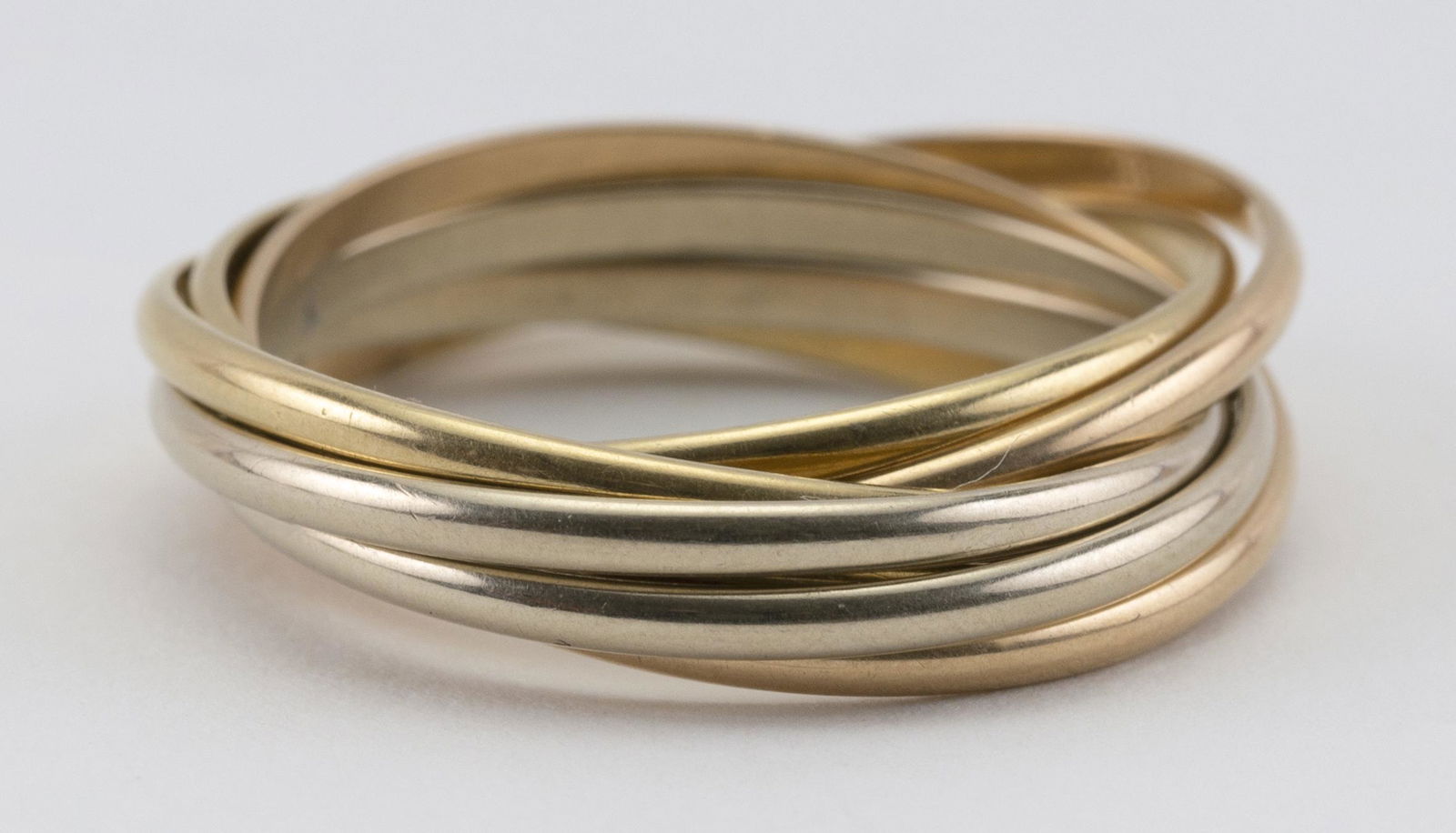 CARTIER “TRINITY” 18KT TRICOLOR GOLD SEVEN-BAND RING (1 of 1)