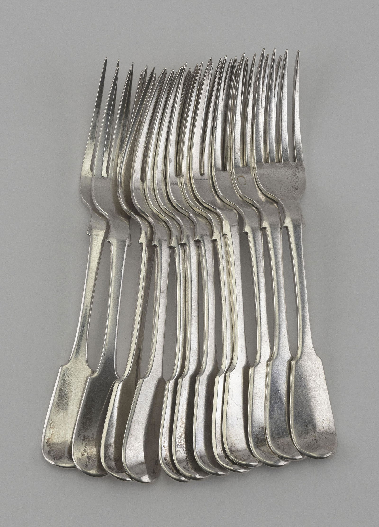 TWELVE SILVER FIDDLEBACK DINNER FORKS Approx. 22.7 (1 of 2)