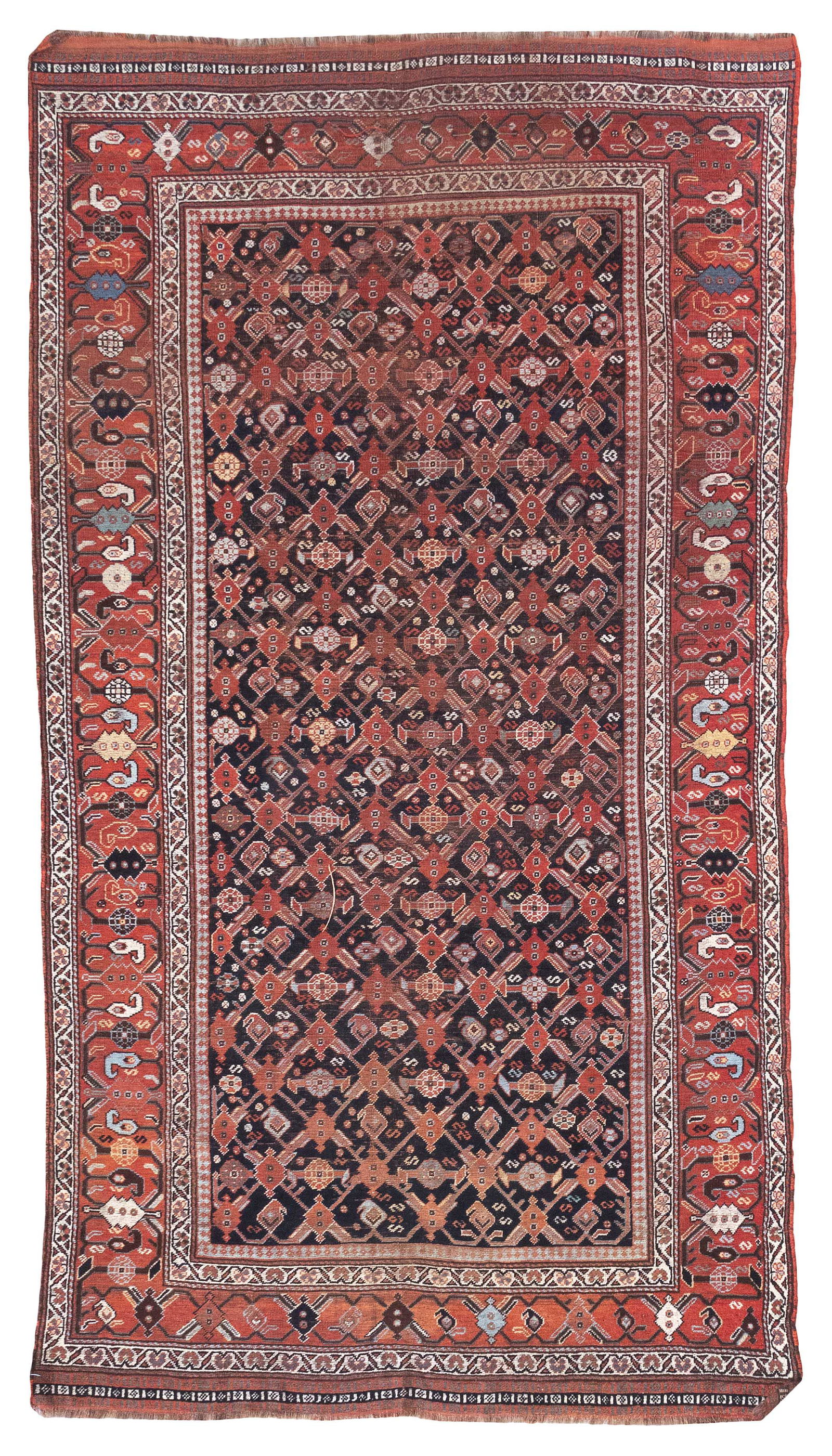 KHAMSEH RUG: 5'2" X 9'4" Circa 1900: KHAMSEH RUG: 5'2" X 9'4"Circa 1900Navy blue field with a lattice pattern formed by red and blue linear vines adorned with rust red, pale blue, yellow and ivory stylized blossoms. Broad red m