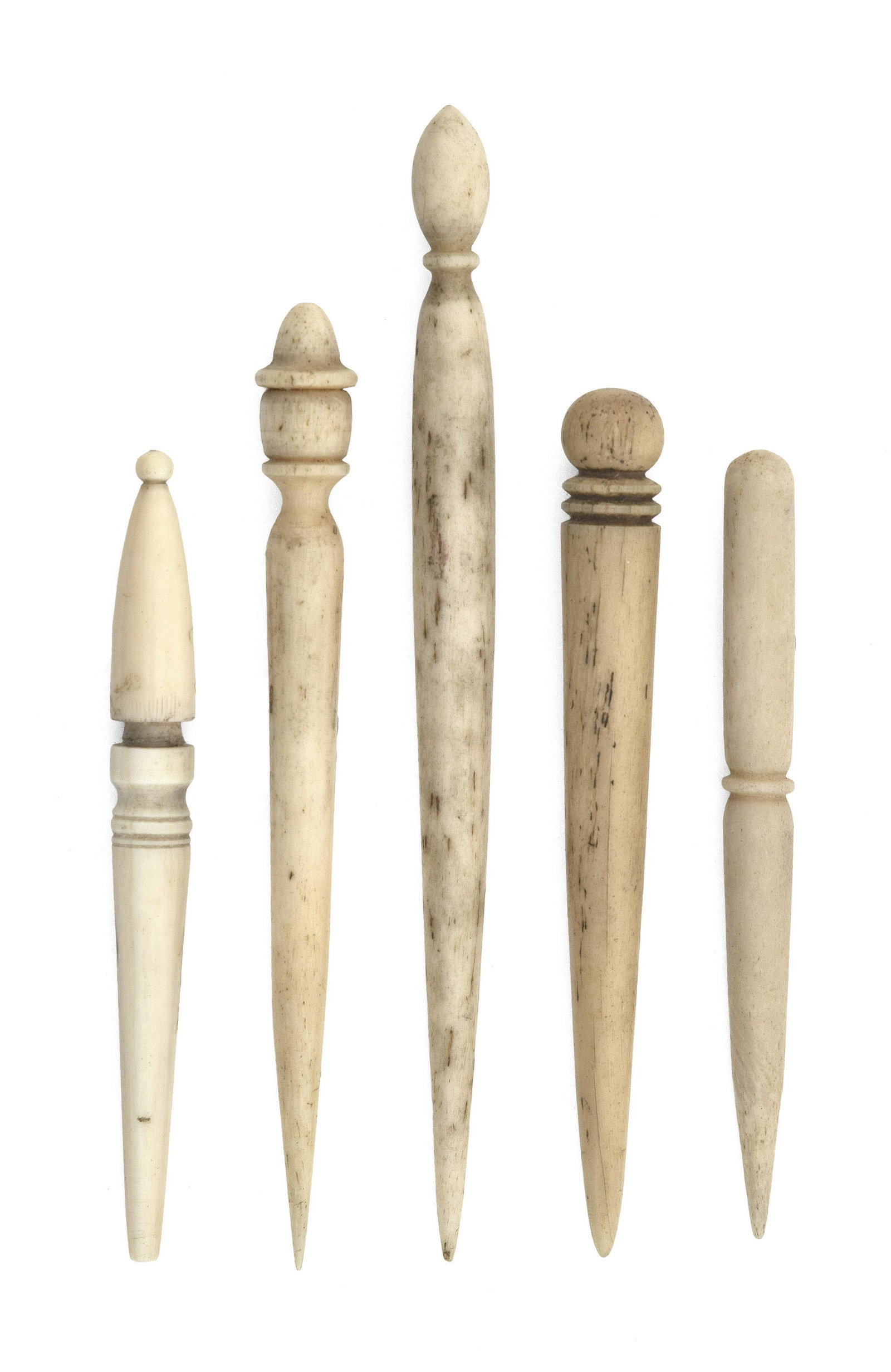 FIVE WHALE IVORY AND WHALEBONE BODKINS: FIVE WHALE IVORY AND WHALEBONE BODKINS Mid-19th Century Differing forms, all with decorative turnings. Lengths from 2.75" to 4.25".