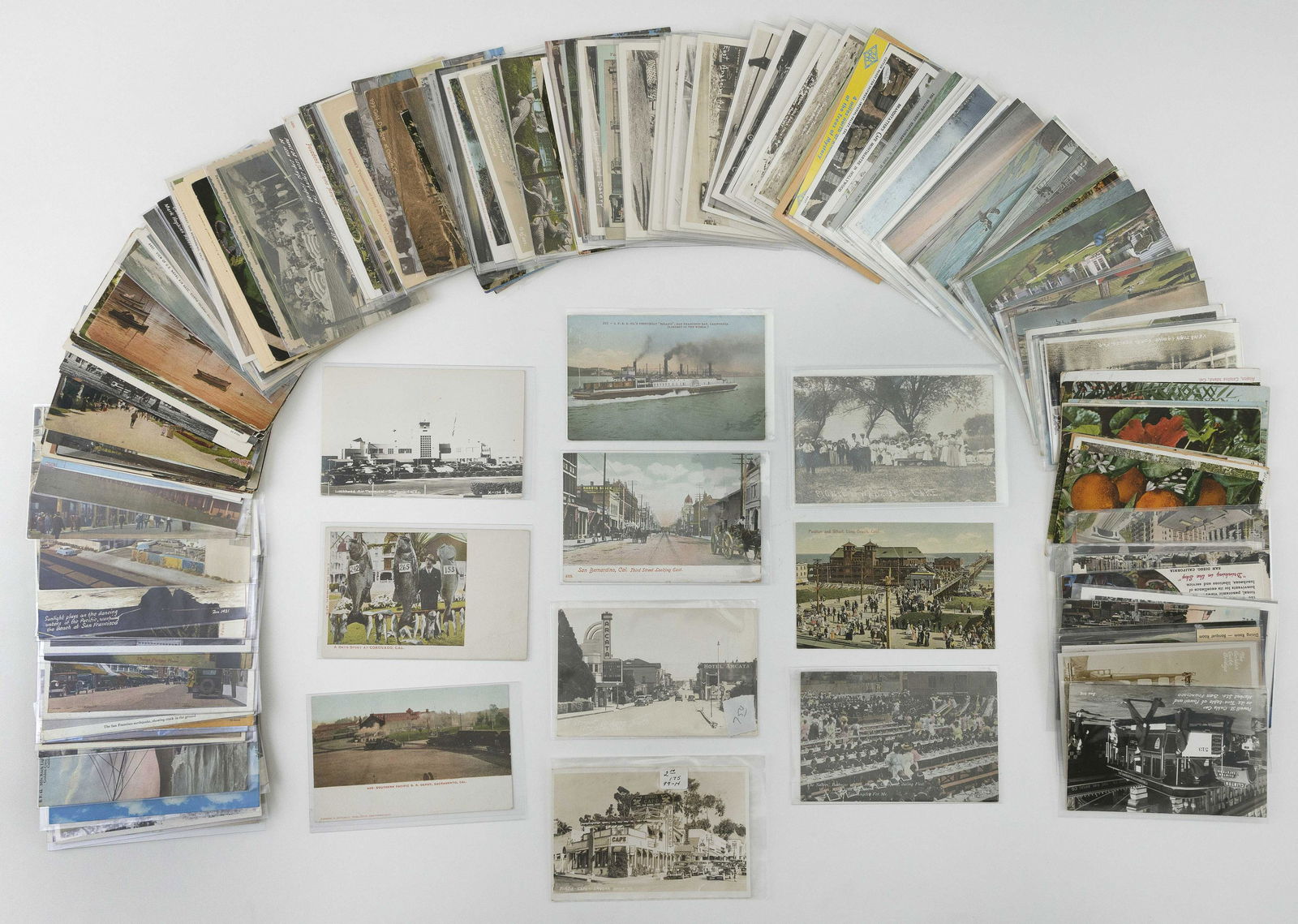 (VIEW) CALIFORNIA: 209 POSTCARDS Early to Mid-20th: (VIEW) CALIFORNIA: 209 POSTCARDSEarly to Mid-20th CenturyReal photo: Arcade St. scene, Lockhead Air terminal (Burbank), Mrs. Gay At Gay's Lion Farm, picnic at Wahtoke Lake, five Hollywood Bowl views,