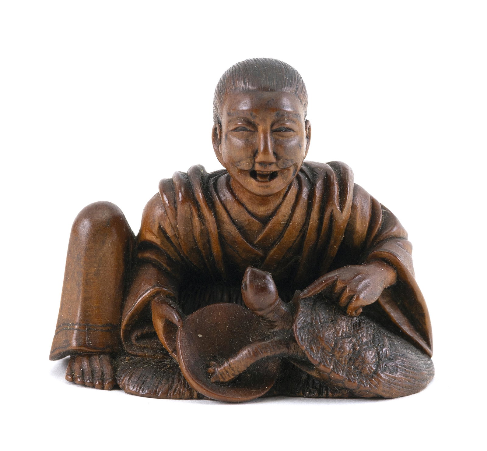 JAPANESE WOOD NETSUKE 19th Century Height 1.75".: JAPANESE WOOD NETSUKE 19th Century A seated man with a turtle. Height 1.75". Provenance: The Collection of Gloria and Joe Kurilecz.