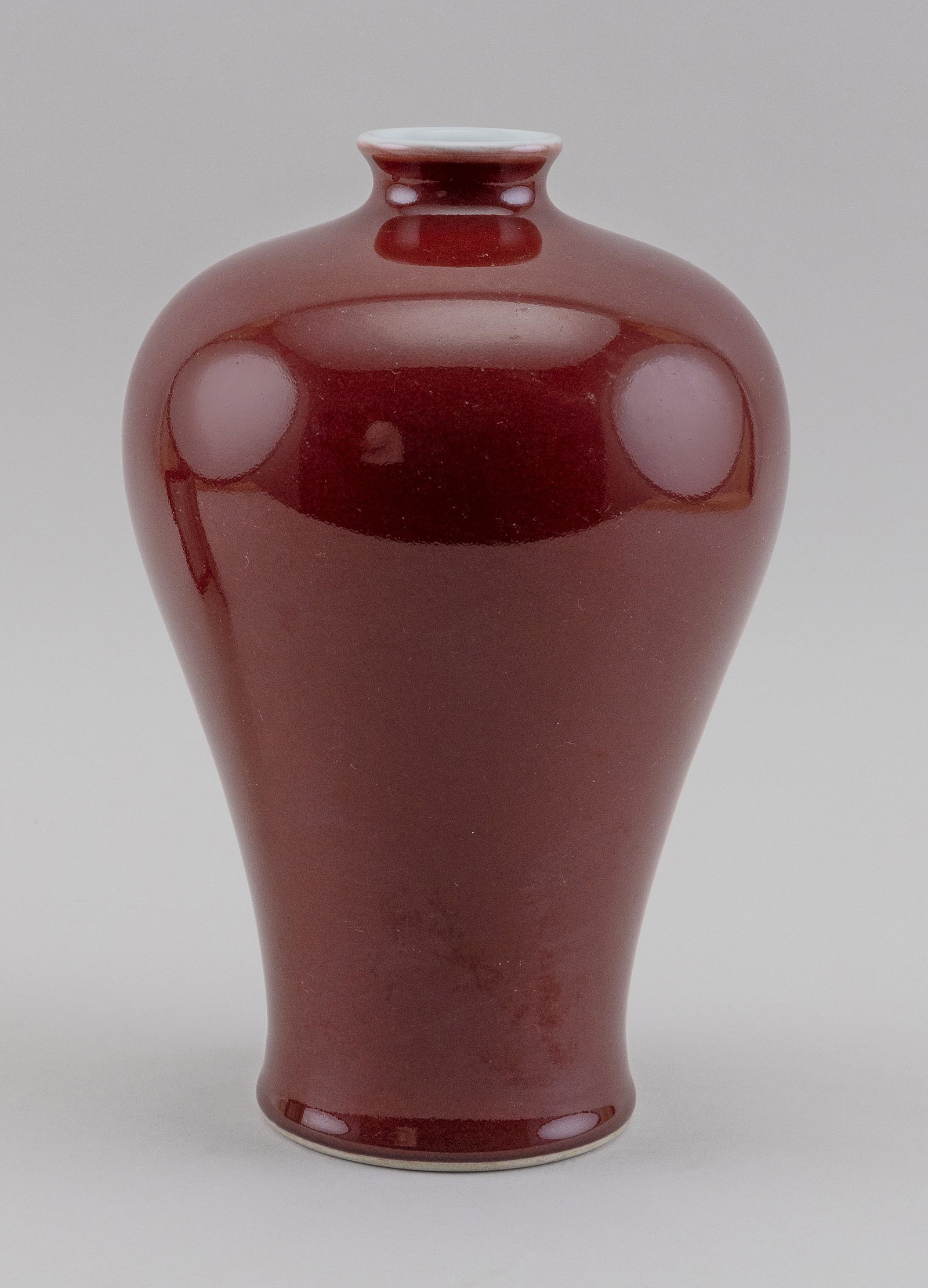 CHINESE SANG DE BOEUF PORCELAIN MEIPING VASE Early 20th: CHINESE SANG DE BOEUF PORCELAIN MEIPING VASE Early 20th Century Six-character Qianlong mark on base. Height 9.5".
